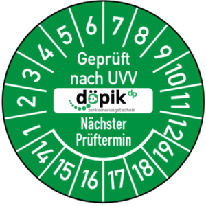 Grüne UVV Prüfplakette für hand- und kranbeschickte Holzhacker